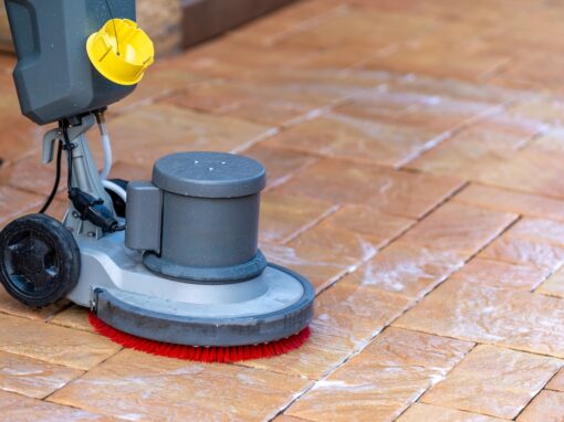manual cleaning of concrete and stone pavements with a mechanical brush water and detergent